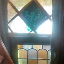 I made a new inner window over the stained glass one, the outer shutters are also double so I can choose how much light I want in. The new window is shoji paper on plexiglass, lined with cedar